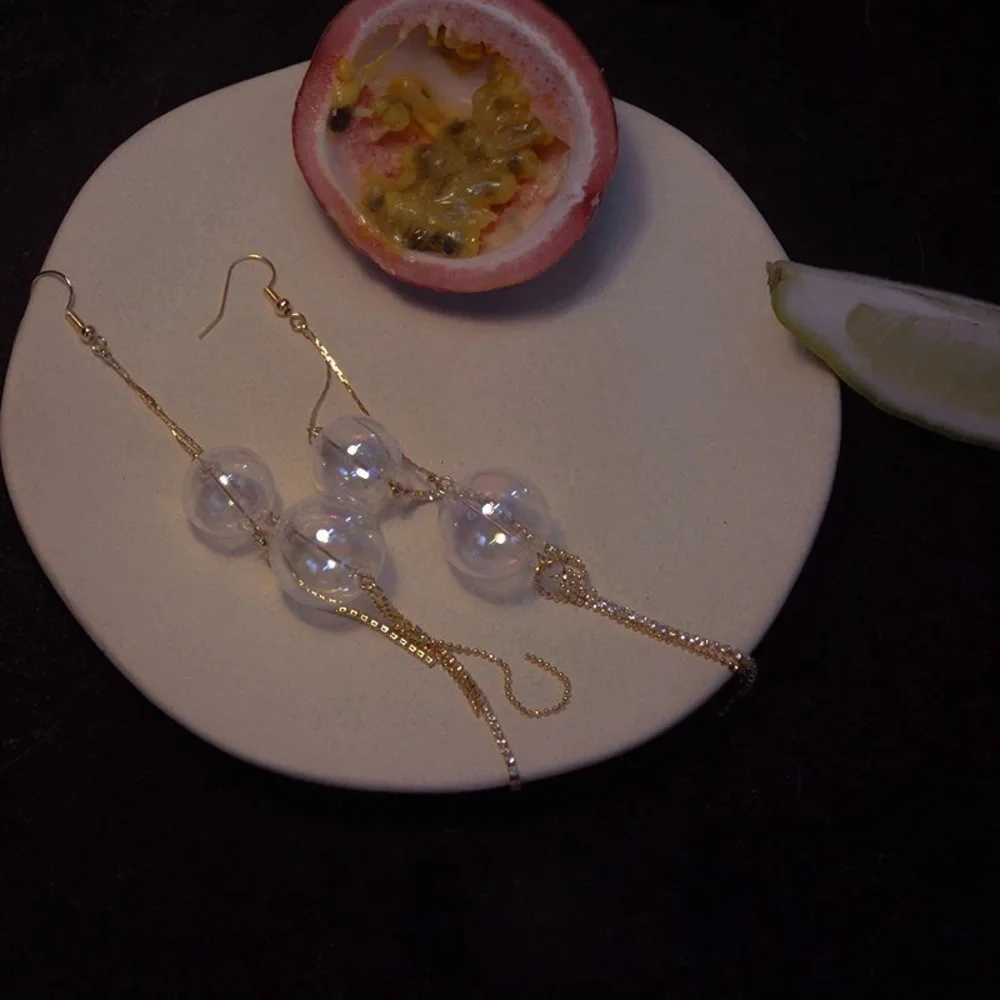 Gold dangle earrings with clear shiny glass beads - Picture 4 of 7